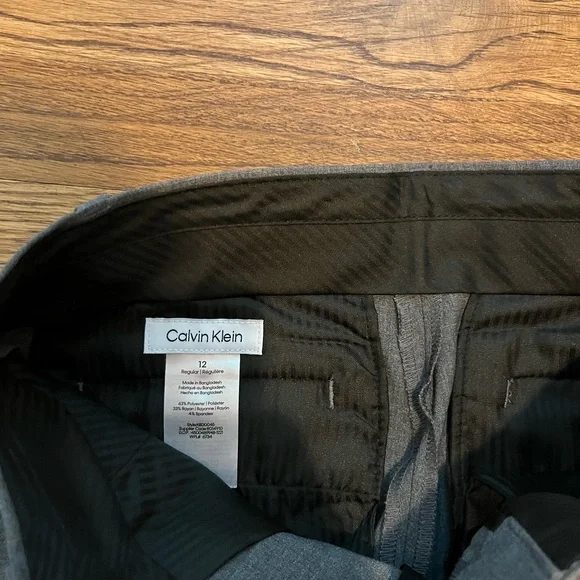 Boys slim stretch fit Calvin Kline gray suit. Size 12 pants/ 14 jacket